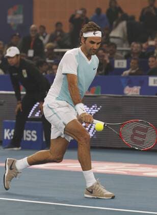 NEW DELHI, INDIA - DECEMBER 12: Roger Federer of Obi UAE Royals in action against Rafael Nadal of Micromax Indian Aces Mens during the Coca-Cola International premier Tennis League at IG Stadium on December 12, 2015 in New Delhi, India. (Photo by Virendra Singh Gosain Hindustan Times ) Coca-Cola International Premier Tennis League