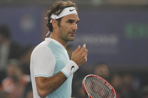 NEW DELHI, INDIA - DECEMBER 12: Roger Federer of Obi UAE Royals in action against Rafael Nadal of Micromax Indian Aces Mens during the Coca-Cola International premier Tennis League at IG Stadium on December 12, 2015 in New Delhi, India. (Photo by Virendra Singh Gosain Hindustan Times ) Coca-Cola International Premier Tennis League