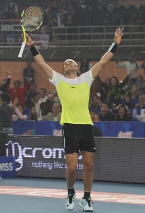 NEW DELHI, INDIA - DECEMBER 12: Rafael Nadal of Micromax Indian Aces Mens in action against Roger Federer of Obi UAE Royals during the Coca-Cola International premier Tennis League at IG Stadium on December 12, 2015 in New Delhi, India. (Photo by Virendra Singh Gosain Hindustan Times ) Coca-Cola International Premier Tennis League