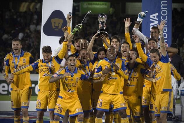 Players of Tigres celebrate after winning the final of the Opening Tournament of the MX League against Pumas in Mexico City, capital of Mexico, on Dec. 13, 2015. Tigres won 4-2 in penalties round to claim the title of the tournament. Pedro Mera) (rhj) (SP)MEXICO-MEXICO CITY-SOCCER-PUMAS VS TIGRES-FINAL e AlejandroxAyala 
