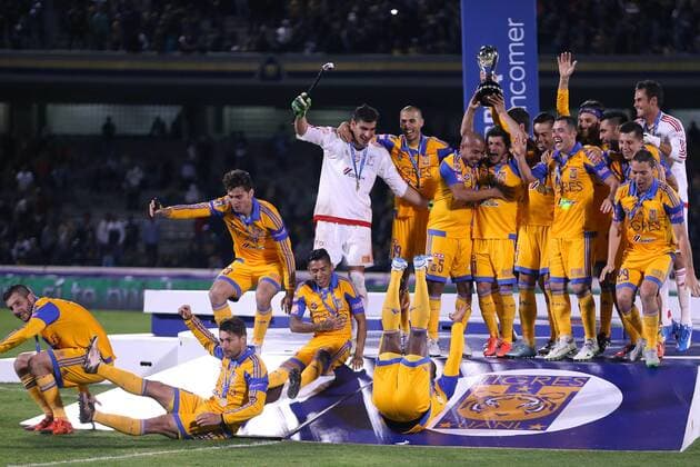 Players of Tigres celebrate after winning the final of the Opening Tournament of the MX League against Pumas in Mexico City, capital of Mexico, on Dec. 13, 2015. Tigres won 4-2 in penalties round to claim the title of the tournament. Jorge Rios) (rhj) (SP)MEXICO-MEXICO CITY-SOCCER-PUMAS VS TIGRES-FINAL e JorgexRios 