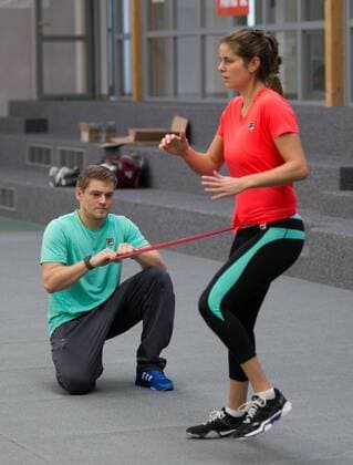 Julia Goerges (GER) und Fitnesstrainer Florian Zitzelsberger beim Aufwaermtraining, Deutsche Meisterschaft in Biberach an der Riß, 44. Deutschen Hallenmeisterschaften 2015 Tennis - Deutsche Meisterschaft 2015 - Deutsche Meisterschaft - - Biberach an der Riss - Baden-Wuerttemberg - Germany