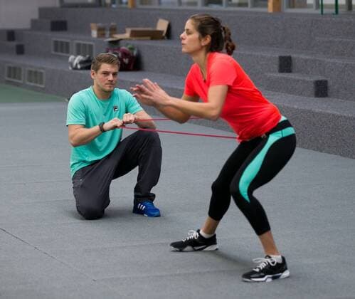 Julia Goerges (GER) und Fitnesstrainer Florian Zitzelsberger beim Aufwaermtraining, Deutsche Meisterschaft in Biberach an der Riß, 44. Deutschen Hallenmeisterschaften 2015 Tennis - Deutsche Meisterschaft 2015 - Deutsche Meisterschaft - - Biberach an der Riss - Baden-Wuerttemberg - Germany