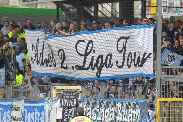 Freiburg 1860 Fans mit Banner Adios 2 Liga Tour, SC Freiburg vs. TSV 1860 Muenchen, 2.Bundesliga, Fussball, 20.12.2015, Copyright: Langer Eibner-Pressefoto EP_HLR