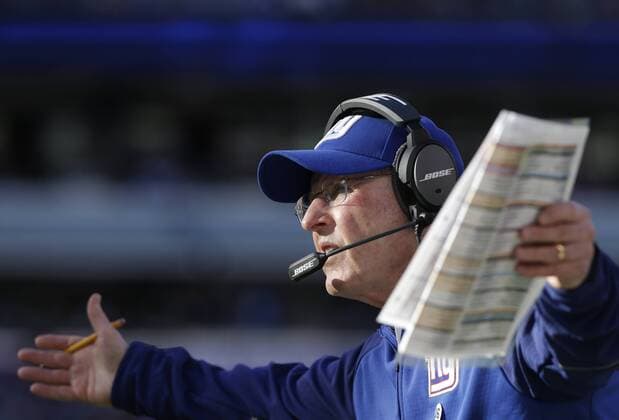 New York Giants head coach Tom Coughlin reacts at an official in the first quarter against the Carolina Panthers at MetLife Stadium in East Rutherford, New Jersey on December 20, 2015. The Panthers defeated the Giants 38-35 and remain undefeated at 14-0.  NYP20151220113 JOHNxANGELILLO