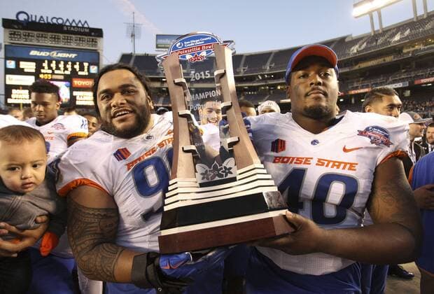 Dec. 23, 2015 - San Diego, USA - SAN DIEGO, December 23, 2015 Boise State players Justin Taimatuia, left, and Armand Nance carry the trophy after Boise State beat NIU 55-7 during the Poinsettia Bowl at Qualcomm Stadium in San Diego on Wednesday. -Mandatory Photo Credit: Photo by Hayne Palmour IV San Diego Union-Tribune, LLC San Diego USA - ZUMAs44_ DEC 23 2015 San Diego USA San Diego December 23 2015 Boise State Players Justin left and Armand NANCE Carry The Trophy After Boise State Beat Niu 55 7 during The Poinsettia Bowl AT Qualcomm Stage in San Diego ON Wednesday Mandatory Photo Credit Photo by Hayne Palmour IV San Diego Union Tribune LLC San Diego USA ZUMAs44_ Dec 23 2015 San Diego USA SAN DIEGO December 23 2015 Boise State players Justin Taimatuia - ZUMA1