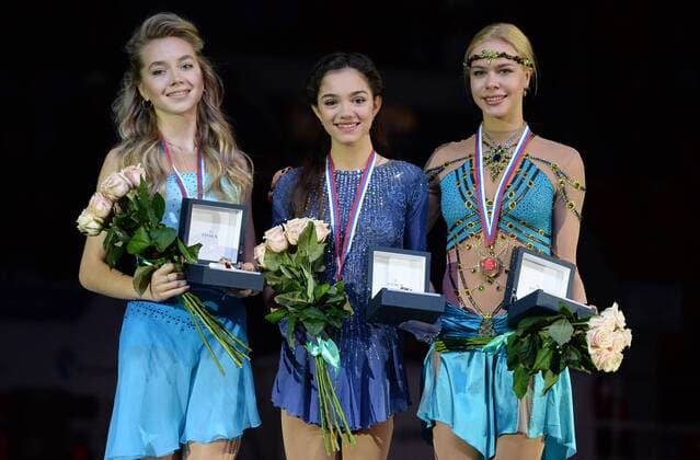 YEKATERINBURG, RUSSIA. DECEMBER 27, 2015. Silver medallist Yelena Rodionov, gold medal winner Yevgenia Medvedeva, and bronze medallist Anna Pogorilaya (L-R) during the medal ceremony for the ladies singles Figure skating Eiskunstlauf competition at the 2015 2016 Russian Figure Skating Championships. Donat Sorokin TASS  TS014B97