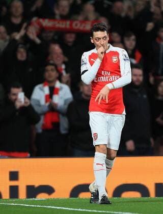 Themen der Woche - SPORT Arsenal s Mesur Ozil celebrates scoring his sides second goal Barclays Premier League- Arsenal vs AFC Bournemouth - Emirates Stadium - England - 28th December 2015 - Picture - David Klein Sportimage EDITORIAL USE ONLY. No use with unauthorised audio, video, data, fixture lists, club league logos or live services. Online in-match use limited to 120 images, no video emulation. No use in betting, games or single club league player publications.