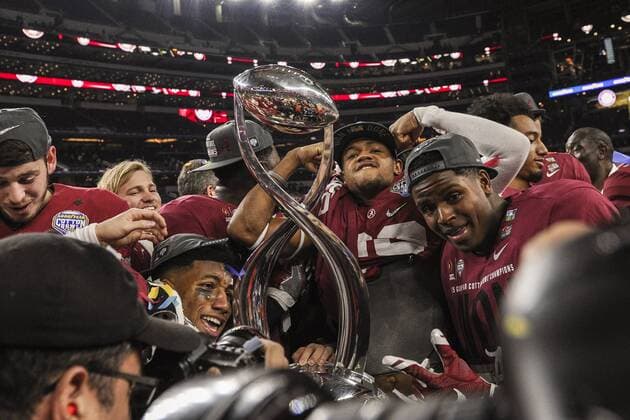 Alabama players celebrate after defeating the Michigan State Spartans 38-0 in the College Football Playoff Semifinal at the Goodyear Cotton Bowl Classic at AT&T Stadium on December 31, 2015 in Arlington, Texas. Alabama will face Clemson in the National Championship on January 11, 2016.  DAL20151231318 MICHAELxPRENGLER