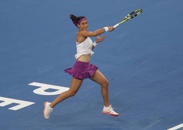 Jan. 4, 2016 - Perth, Australia - CAROLINE CARCIA (FRA) returns a serve against HEATHER WATSON (GBR) during the women s singles on Day 2 at the Hopman Cup tennis tournament in Perth, Australia. CAROLINE CARCIA (FRA) - ZUMAk129