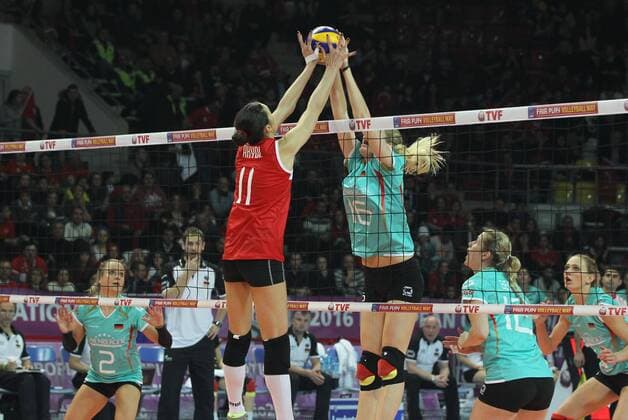 2016 European Olympic Qualification Pool A Day 2 - match Turkey and Germany at Baskent Volleyball Hall in Ankara on January 5, 2016. Final Score: Turkey 3 - Germany 1 Pictured: Naz Aydemir Akyol 11 of Turkey and Anja Brandt 16 of Germany. 