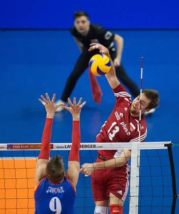 Berlin, Deutschland, 05.01.2016: Volleyball Olympia Qualifikation Männer Maenner 2016 - Spiel 3 Serbien - Polen. Michal Kubiak (Poland 13) against Nikola Jovovic (Serbia 9)