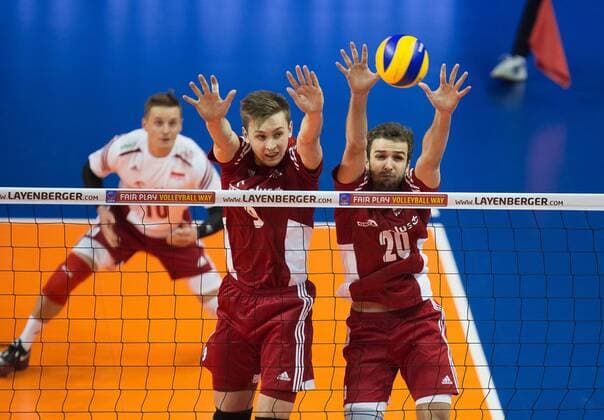 Berlin, Deutschland, 05.01.2016: Volleyball Olympia Qualifikation Männer Maenner 2016 - Spiel 3 Serbien - Polen. block Mateusz Bieniek (Poland 9) and Mika Mateusz (Poland 20)