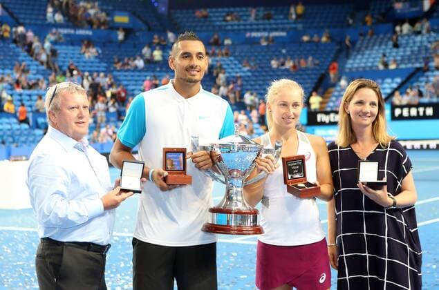 (160109) -- PERTH, Jan. 9, 2016 -- Nick Kyrgios (2nd L) and Daria Gavrilova (2nd R) of Australia pose with the trophy after winning the Hopman Cup tennis tournament against Ukraine in Perth, Australia, Jan. 9, 2016. ) (SP)AUSTRALIA-PERTH-TENNIS-HOPMAN CUP ZhouxDan 