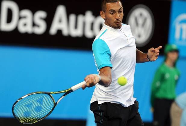 (160109) -- PERTH, Jan. 9, 2016 -- Nick Kyrgios of Australia hits a return during the men s singles match against Alexandr Dolgopolov of Ukraine at the Hopman Cup tennis tournament in Perth, Australia, Jan. 9, 2016. Kyrgios won 2-0. ) (SP)AUSTRALIA-PERTH-TENNIS-HOPMAN CUP ZhouxDan 