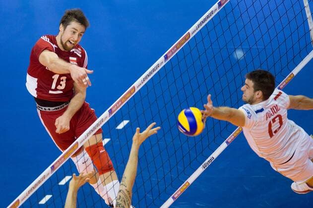09.01.2016, Max Schmeling Halle, Berlin Volleyball, Olympiaqualifikation, Frankreich (FRA) vs. Polen (POL) Angriff Michal Kubiak ( 13 POL) - Block Pierre Pujol ( 13 FRA)