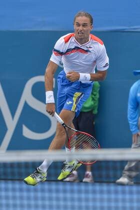 12.01.16 Sydney, Australia. Alexandr Dolgopolov (UKR) in action against Thomas Belluci (BRA) during their mens singles match on day 3 at the Apia International Sydney. Dolgopolov won the match 6-1,6-4. xNigelxOwenx  ActionPlus11696256