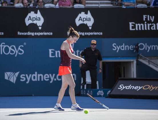 (160113) -- SYDNEY, Jan. 13, 2016 -- Simona Halep of Romania smashes her racket during her match against Karolina Pliskova of the Czech Republic at the Sydney International tennis tournament in Sydney, Australia, Jan. 13, 2016. Simona Halep won 2-0 to take her place in the semifinals.) (SP)AUSTRALIA-SYDNEY-INT L TENNIS TOURNAMENT ZhuxHongye 