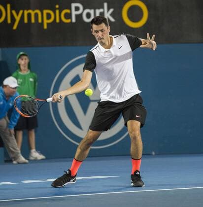 SYDNEY, Jan. 13, 2016 -- Bernard Tomic of Australia hits a return during the men s singles round of 16 match against compatriot Jordan Thompson at the Apia International Sydney in Sydney, Australia, on Jan. 13, 2016. Bernard Tomic won 2-0. ) (SP)AUSTRALIA-SYDNEY-TENNIS-INTERNATIONAL ZhuxHongye 