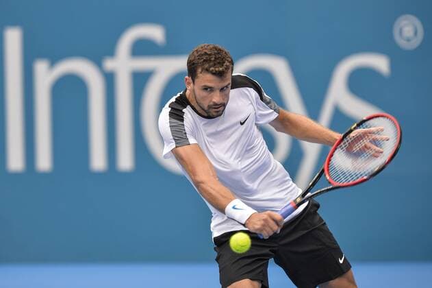 14.01.16 Sydney, Australia. Grigor Dimitrov (BUL) in action against Alexandr Dolgopolov (UKR) during their mens singles match on day 5 at the Apia International Sydney. xNigelxOwenx  ActionPlus11696858