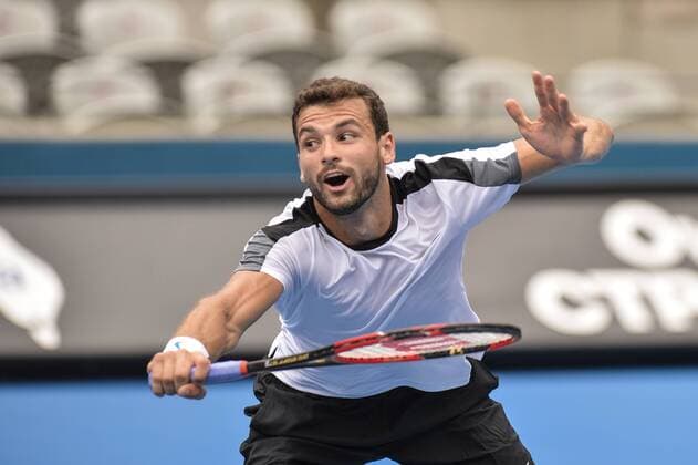 14.01.16 Sydney, Australia. Grigor Dimitrov (BUL) in action against Alexandr Dolgopolov (UKR) during their mens singles match on day 5 at the Apia International Sydney. xNigelxOwenx  ActionPlus11696859