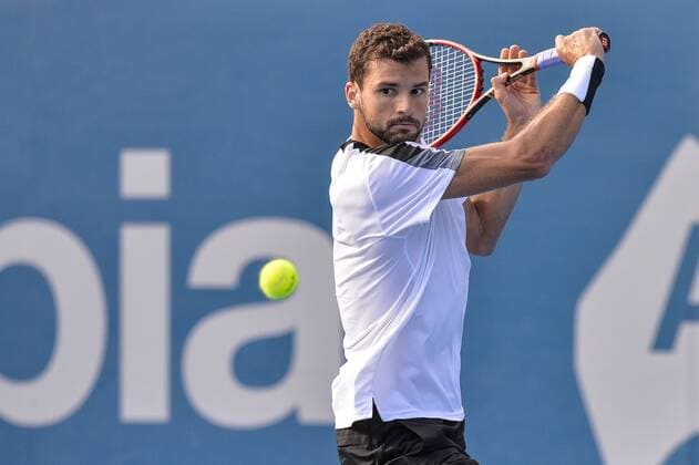 15.01.16 Sydney, Australia. Grigot Dimitrov (BUL) in action against Gilles Muller (LUX) during their mens singles semi final match on day 6 at the Apia International Sydney. Dimitrov won the match 6-2,7-6. xNigelxOwenx  ActionPlus11696990