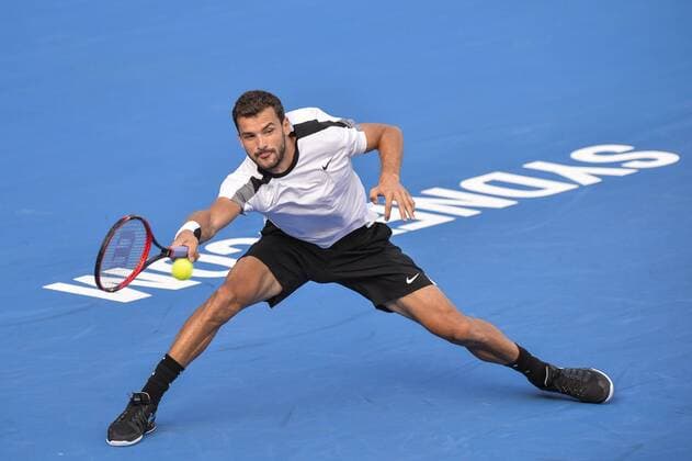 15.01.16 Sydney, Australia. Grigot Dimitrov (BUL) in action against Gilles Muller (LUX) during their mens singles semi final match on day 6 at the Apia International Sydney. Dimitrov won the match 6-2,7-6. xNigelxOwenx  ActionPlus11696996