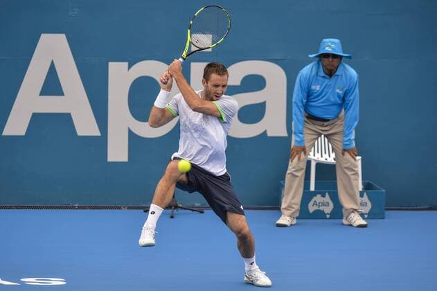 15.01.16 Sydney, Australia. Victor Troicki (SRB) in action against Nicolas Mahut (FRA) during their mens singles match on day 6 at the Apia International Sydney. xNigelxOwenx  ActionPlus11697008