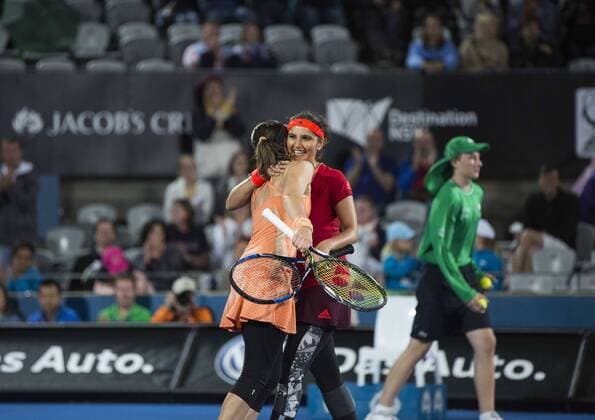 (160116) -- SYDNEY, Jan. 15, 2016 -- Martina Hingis (L) of Switzerland hugs Sania Mirza of India during the women s doubles final against Caroline Garcia and Kristina Mladenovic of France at the Apia International Sydney tennis tournament in Sydney, Australia, Jan. 15, 2016. Martina Hingis and Sania Mirza won 2-1. ) (SP)AUSTRALIA-SYDNEY-TENNIS-APIA INTERNATIONAL SYDNEY ZhuxHongye 
