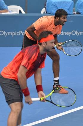 16.01.16 Sydney, Australia. Rohan Bopanna (IND) and Florin Mergea (ROU) in action against Jamie Murray (GBR) and Bruno Soares (BRA) during their mens doubles final match at the Apia International Sydney. Murray and Soares won the final 6-3,7-6. xNigelxOwenx  ActionPlus11697354