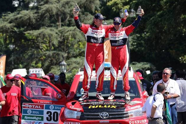 - ROSARIO, ARGENTINA: South African driver Geniel Devilliers and his co-driver Dirk von Zitzewitz celebrate on their Hilux Toyota the final stage of the 2016 Dakar Rally Race from Villa Carlos Paz to Rosario, Argentina, on Saturday 16 January 2016. The 2016 Dakar Rally takes place from 03 till 16 January 2014 in Argentina and Bolivia. WILLYxWEYENS  x04775587x