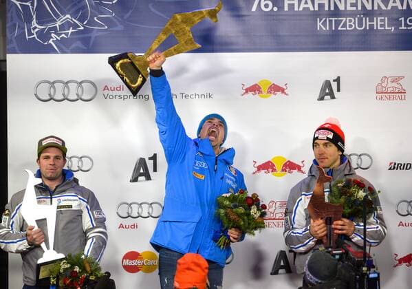 ALPINE SKIING - FIS WC Kitzbuehel KITZBUEHEL,AUSTRIA,23.JAN.16 - ALPINE SKIING - FIS World Cup, Hahnenkamm-race, downhill, men, award ceremony. Image shows Beat Feuz (SUI), Peter Fill (ITA) and Carlo Janka (SUI). Keywords: trophy. GEPAxpictures xHansxOsterauer