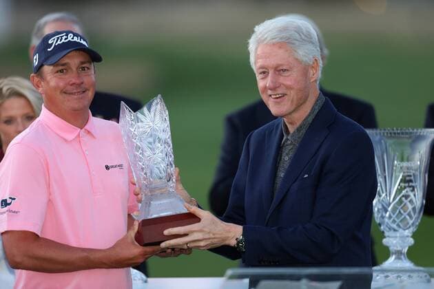 January 24, 2016 Jason Dufner (L) poses with former President Bill Clinton after winning the CareerBuilder Challenge In Partnership With The Clinton Foundation on the second playoff hole on the 18th green at the TPC Stadium course at PGA Golf Herren West in La Quinta, California.. PGA 2016: CareerBuilder Challenge JAN 24 - ZUMAcb8_