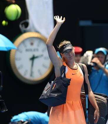 (160126) -- MELBOURNE, Jan. 26, 2016 -- Russia s Maria Sharapova waves to the spectators after losing to Serena Williams of the United States during the quarterfinal of women s singles at the Australian Open Tennis Championships in Melbourne, Australia, Jan. 26, 2016. Maria Sharapova lost the match 4-6, 1-6. ) (msq) (SP)AUSTRALIA-MELBOURNE-TENNIS-AUSTRALIAN OPEN-DAY 9 BixMingming 