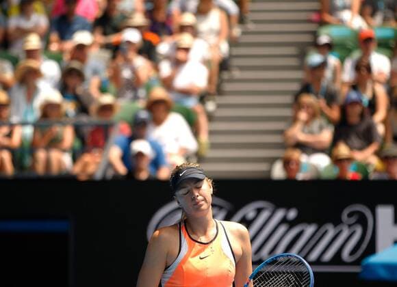 (160126) -- MELBOURNE, Jan. 26, 2016 -- Russia s Maria Sharapova reacts during the quarterfinal of women s singles against Serena Williams of the United States at the Australian Open Tennis Championships in Melbourne, Australia, Jan. 26, 2016. Maria Sharapova lost the match 4-6, 1-6. ) (msq) (SP)AUSTRALIA-MELBOURNE-TENNIS-AUSTRALIAN OPEN-DAY 9 BixMingming 