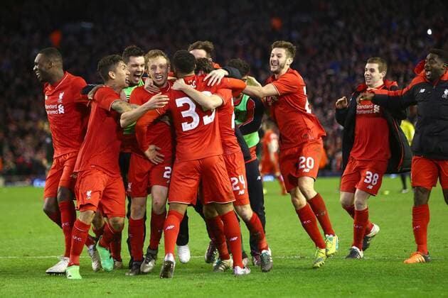 Fußball, League Cup, FC Liverpool besiegt Stoke City Joe Allen of Liverpool is mobbed by team mates in celebration of victory - Capital One League Cup Semi Final Second Leg - Liverpool vs Stoke City - Anfield - Liverpool - 26 01 2016 Pic Philip Oldham SportImage EDITORIAL USE ONLY. No use with unauthorised audio, video, data, fixture lists, club league logos or live services. Online in-match use limited to 120 images, no video emulation. No use in betting, games or single club league player publications.