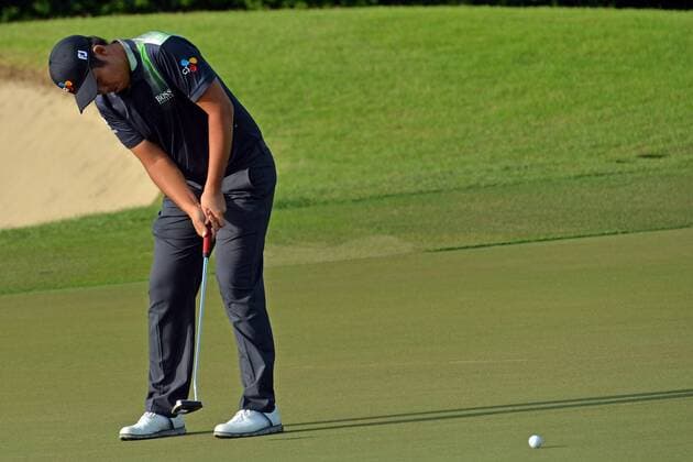 (160128) -- SINGAPORE, Jan. 28, 2016 -- An Byeong-hun of South Korea competes during the SMBC Singapore Open held at Singapore s Sentosa Golf Club Serapong course, Jan. 28, 2016. The SMBC Singapore Open is being held at Singapore s Sentosa Golf Club from Jan. 28 to Jan. 31. ) (SP)SINGAPORE-GOLF-SMBC SINGAPORE OPEN ThenxChihxWey 