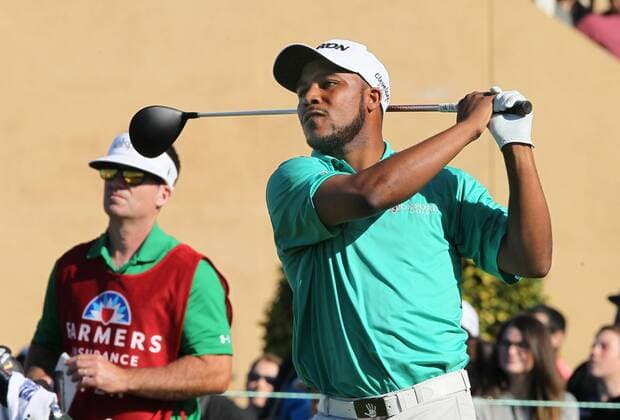 Jan. 29, 2016 - San Diego, CA, USA - Harold Varner III hits from the 1st tee during the second round of the Farmers Insurance Open on Torrey Pines south course on Friday, Jan. 29, 2016. Rickie Fowler looks to the ocean as he waits to putt on scenic hole 3 of the South Course. - ZUMAm67_