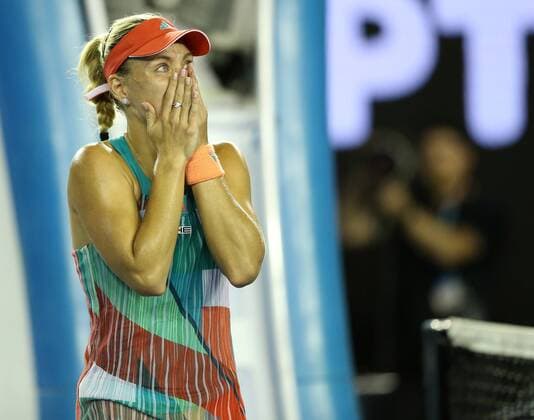 (160130) -- MELBOURNE, Jan. 30, 2016 -- Angelique Kerber of Germany reacts after winning the final of women s singles against Serena Williams of the United States at the Australian Open Tennis Championships in Melbourne, Australia, Jan. 30, 2016. Angelique Kerber won the match 6-4, 3-6, 6-4. ) (SP)AUSTRALIA-MELBOURNE-TENNIS-AUSTRALIAN OPEN-WOMEN S SINGLES-FINAL BixMingming 