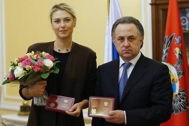 MOSCOW, RUSSIA. FEBRUARY 5, 2016. Russian professional tennis player Maria Sharapova (L) and Russia s Sports Minister Vitaly Mutko seen during a ceremony to present state awards. Sharapova has been awarded a Medal of the Order For Merit to the Fatherland (2nd class) for her charity work and a Medal of the Order For Merit to the Fatherland (1st class) for her great contribution into the physical culture and sports development. Andrei Golovanov TASS  TS0169A6