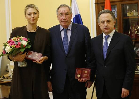 MOSCOW, RUSSIA. FEBRUARY 5, 2016. Russian professional tennis player Maria Sharapova, Russian Tennis Federation President Shamil Tarpishchev and Russia s Sports Minister Vitaly Mutko (L-R) seen during a ceremony to present state awards. Sharapova has been awarded a Medal of the Order For Merit to the Fatherland (2nd class) for her charity work and a Medal of the Order For Merit to the Fatherland (1st class) for her great contribution into the physical culture and sports development. Andrei Golovanov TASS  TS0169A8