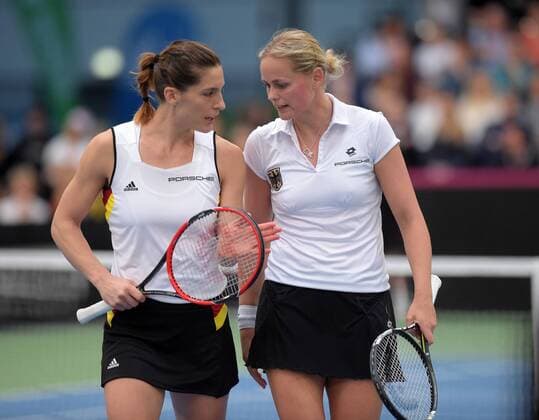 Leipzig Andrea Petkovic (GER) und Anna-Lena Groenefeld Groenefeld (GER) beim Fed Cup Erste Runde, 5. Spiel - Doppel - Andrea Petkovic (GER) und Anna-Lena Groenefeld Groenefeld (GER) vs Belinda Bencic (SUI) und Martina Hingis (SUI), 07.02.2016 , Copyright: Modla Eibner-Pressefoto ep_cma