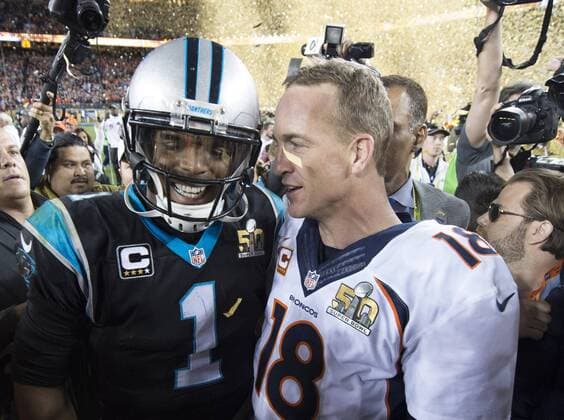 Denver Broncos quarterback Peyton (R) talks to Carolina Panters quarterback Cam Newton after the Broncos defeated the Panthers 24-10 in Super Bowl 50 at Levi s Stadium in Santa Clara, California, February 7, 2015.  SBP20160207957 KEVINxDIETSCH