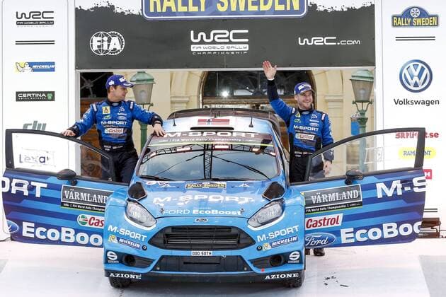 Motorsport, WRC, Rallye Schweden, Siegerehrung 160214 Mads Östberg med kartläsare Ola Flöene, M World Rally Team, Ford Fiesta RS WRC Motorsport Rallye WM jublar vid prisutdelningen under Rally Sweden den 14 februari 2016 i Karlstad.  Copyright: ANNA-LENAxBERGQVIST BB160214BB461