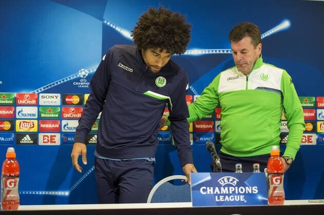 Wolfsburg s Dante and Wolfsburg s head coach Dieter Hecking pictured during a press conference PK Pressekonferenz of German soccer club VfL Wolfsburg, Tuesday 16 February 2016 in Gent. Wolfsburg is preparing for the first leg of the 1 8 finals of the UEFA Champions League competition against Belgian team KAA Gent tomorrow. JASPERxJACOBS  x04794217x