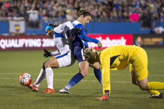 February 15, 2016: United States midfielder Carli Lloyd (10) battles with a Puerto Rico defender to try and recover the ball during the match between the United States and the Puerto Rico during the CONCACAF 2016 Olympic Qualifying Championship at Toyota Stadium, in Frisco, Texas. The US defeated Puerto Rico 10-0. Soccer 2016: United States vs Puerto Rico FEB 15 - ZUMAc04_