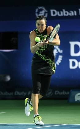 Jelena Jankovic of Serbia hits a return during the women s singles first round match against Belinda Bencic of Switzerland at the 2016 WTA Tennis Damen Dubai Open in Dubai, the United Arab Emirates, on Feb. 16, 2016. Jelena Jankovic won 2-1. ) (lm) (SP)UAE-DUBAI-TENNIS-DUBAI OPEN LixZhen 
