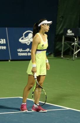 Zheng Saisai of China reacts during the women s singles first round match against Sara Errani of Italy at the 2016 WTA Tennis Damen Dubai Open in Dubai, the United Arab Emirates, on Feb. 16, 2016. Zheng Saisai lost 0-2. ) (lm) (SP)UAE-DUBAI-TENNIS-DUBAI OPEN LixZhen 