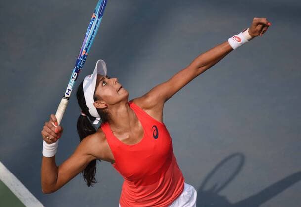 NEW DELHI, INDIA - FEBRUARY 17: Indian tennis player Karman Kaur Thandi in action against Taiwanese tennis player Ya Hsuan Lee during Delhi Open 2016 tournament at DLTA Complex (Delhi Lawn Tennis Association) on February 17, 2016 in New Delhi, India. (Photo by Vipin Kumar Hindustan Times ) Delhi Open 2016 Tournament
