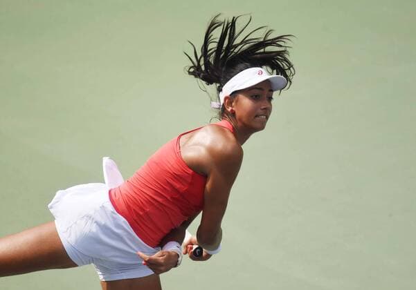 NEW DELHI, INDIA - FEBRUARY 17: Indian tennis player Karman Kaur Thandi in action against Taiwanese tennis player Ya Hsuan Lee during Delhi Open 2016 tournament at DLTA Complex (Delhi Lawn Tennis Association) on February 17, 2016 in New Delhi, India. (Photo by Vipin Kumar Hindustan Times ) Delhi Open 2016 Tournament
